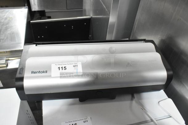 Rentokil 304856 Bug Zapper, 115 Volts, 1 Phase, silver and black, good condition, with visible auction label.