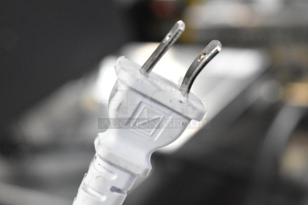 Close-up of Rentokil Bug Zapper plug, model 304856. White two-prong plug for 115 volts, 1 phase.