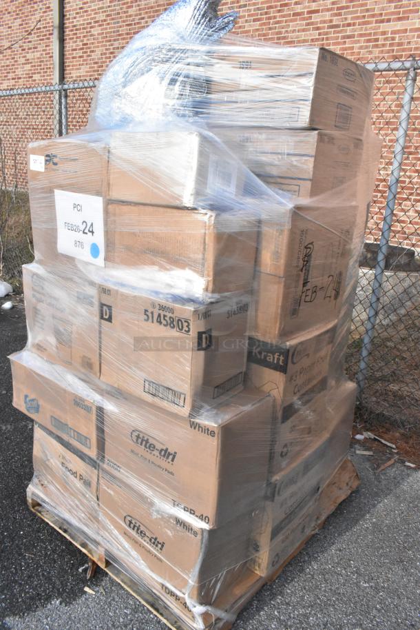 Shrink-wrapped pallet with assorted boxes labeled for items like gloves and containers. Condition: new, scratch and dent. Marked "FEB26-24."