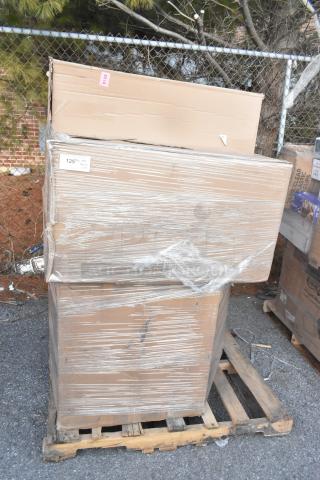 Stack of new boxed items on a pallet, wrapped in plastic. Includes side stools and a mop sink. Scratch and dent condition.