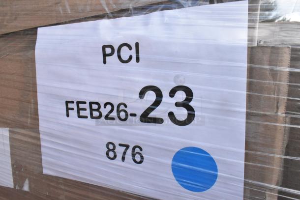 Alt text: Pallet with label "PCI FEB26-23 876" showing brand new scratch and dent items, including side stools and mop sink.