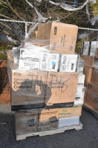 Pallet with various boxed scratch and dent brand new items, including clamshell containers and paper cold cups.