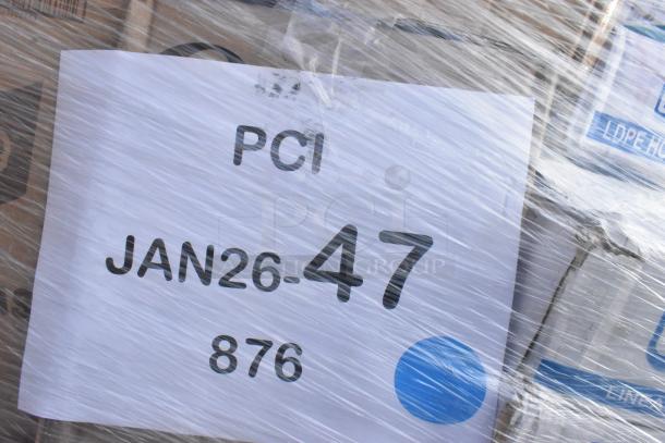 Pallet of 45 new scratch and dent items including bags, gloves, cold cups. Label reads "PCI JAN26-47," under wrap.
