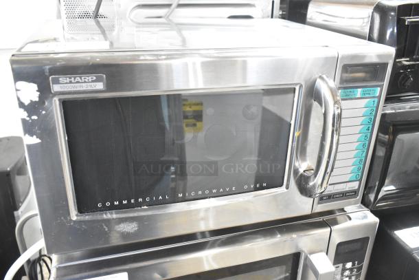 2021 Sharp R-21LVF Commercial Microwave Oven, stainless steel, good condition, keypad controls, 120V, model label visible.