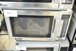 2021 Amana RCS10TS commercial countertop microwave oven, stainless steel, 120 volts, keypad with numeric controls.