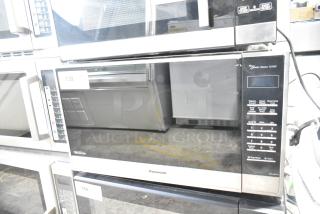 2023 Panasonic NN-SN975S countertop microwave oven with keypad and display, 1250W, 120 volts, 1 phase.