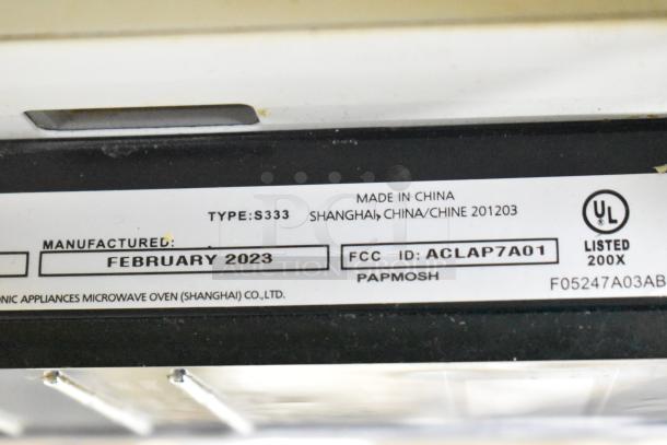 2023 Panasonic NN-SN975S Microwave, 1 Phase, 120 Volts; manufactured Feb 2023 in China. Model and UL listed details shown.