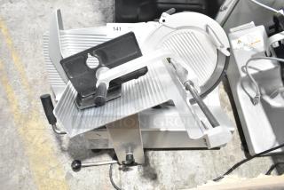 Bizerba GSP H commercial meat slicer, 120 volts, 1 phase, silver, good condition, with visible adjustment knobs and slicing blade.