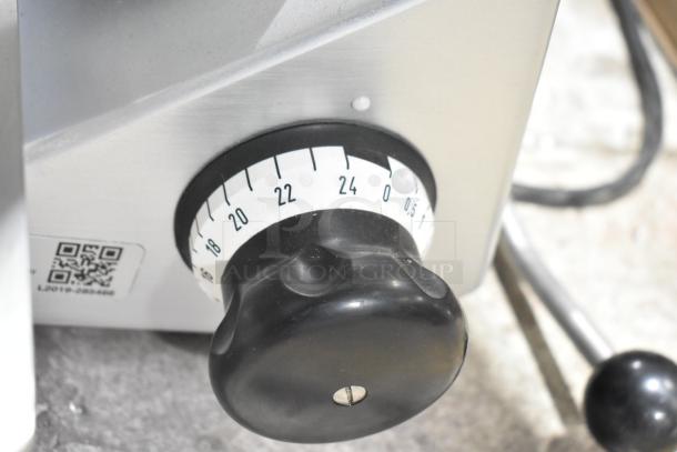 Bizerba GSP H meat slicer dial close-up, showing size settings. Silver metal body and black handle, excellent condition.