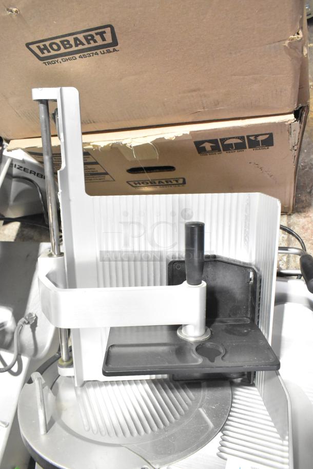 Bizerba GSP H Commercial Meat Slicer, 120V, 1 Phase, countertop model. Features adjustable blade, sturdy design.