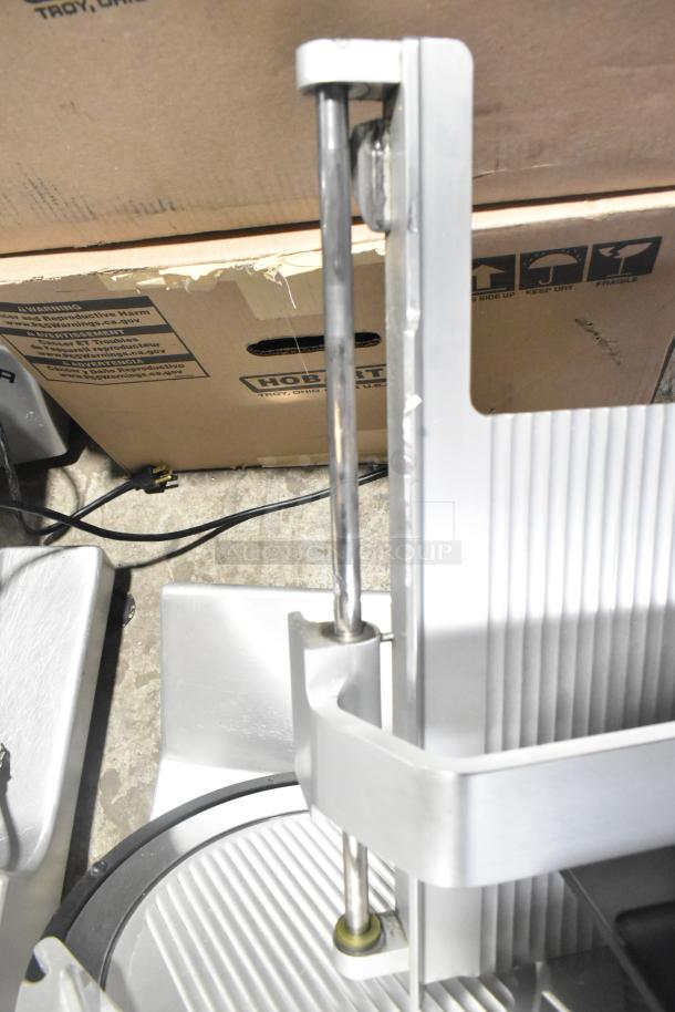 Bizerba GSP H commercial meat slicer, 120V, 1 phase. Features precision slicing mechanism. Good condition.