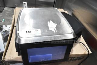 2019 Hobart HTi-7LH3 commercial countertop scale, tested and working, 120/208-240 volts. Shows wear on surface. Auction tag visible.