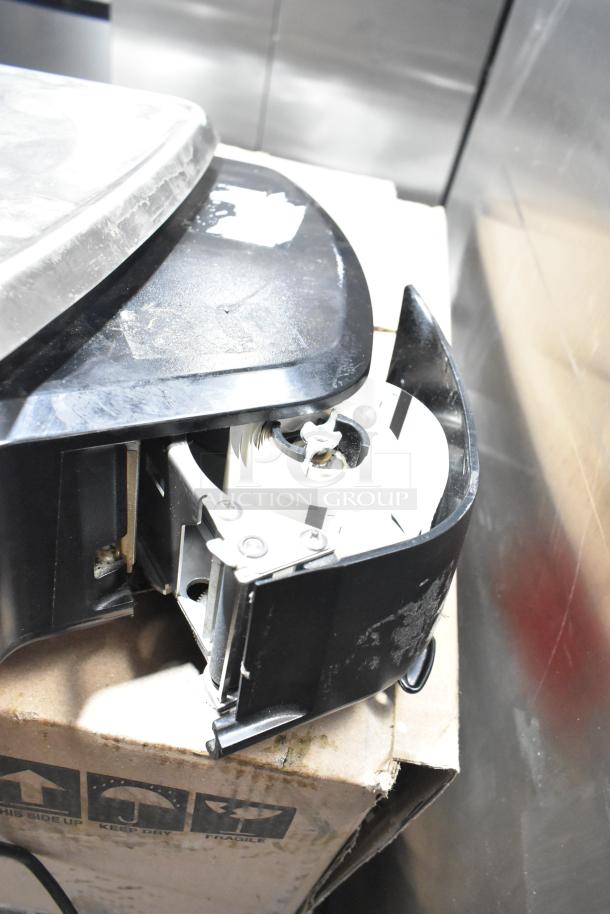 2017 Hobart HTi-7LH26 commercial countertop scale, black casing, visible mechanism, tested and working condition.