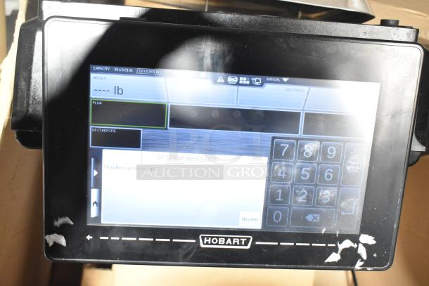 2017 Hobart HTi-7LH26 commercial countertop scale, tested and working, displays weight info, visible Hobart logo.