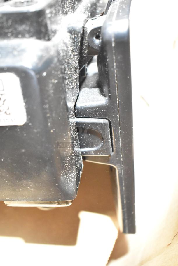 Close-up view of the 2017 Hobart HTi-7LH26 commercial countertop scale, focusing on its side components.