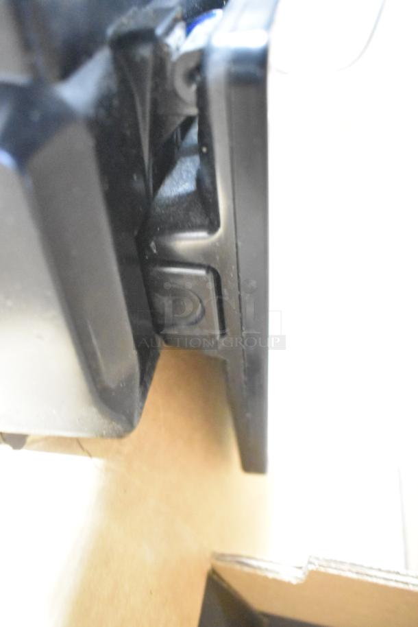 2017 Hobart HTi-7LH26 commercial countertop scale, tested and working, black casing, close-up view of the side detail.