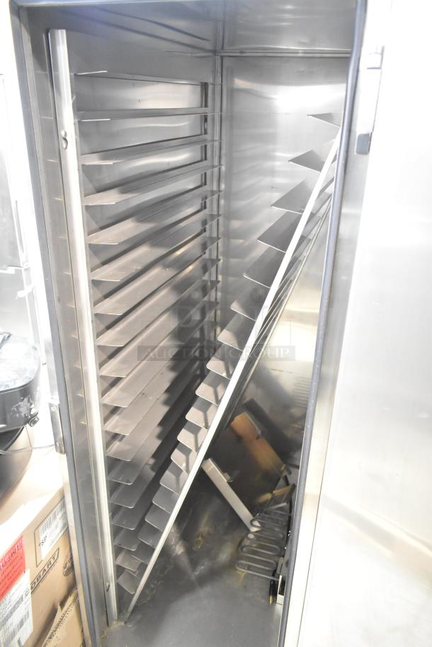 2024 FWE TS-1633-36P heated holding cabinet, stainless steel interior, multiple shelving, 120V, 1 phase, excellent condition.