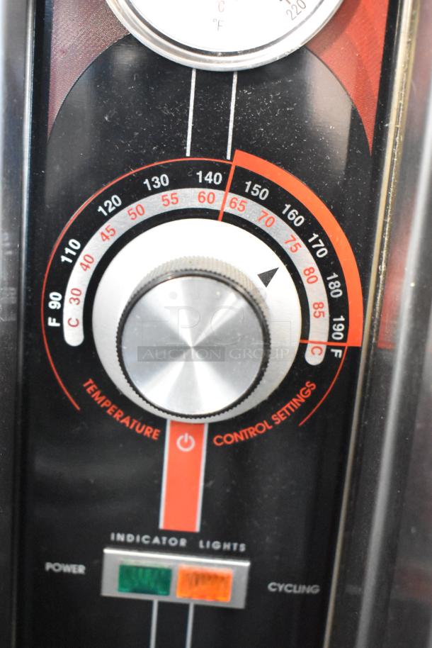 Control panel of FWE TS-1633-36P heated holding cabinet, showing temperature settings and indicator lights, 2024 model.