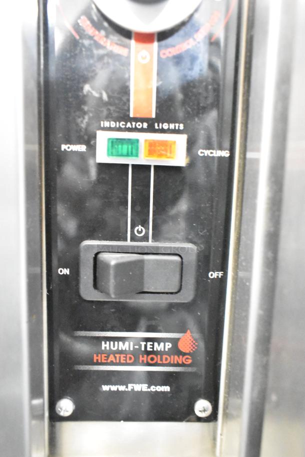 2024 FWE TS-1633-36P Commercial Heated Holding Cabinet control panel with indicator lights and on/off switch.