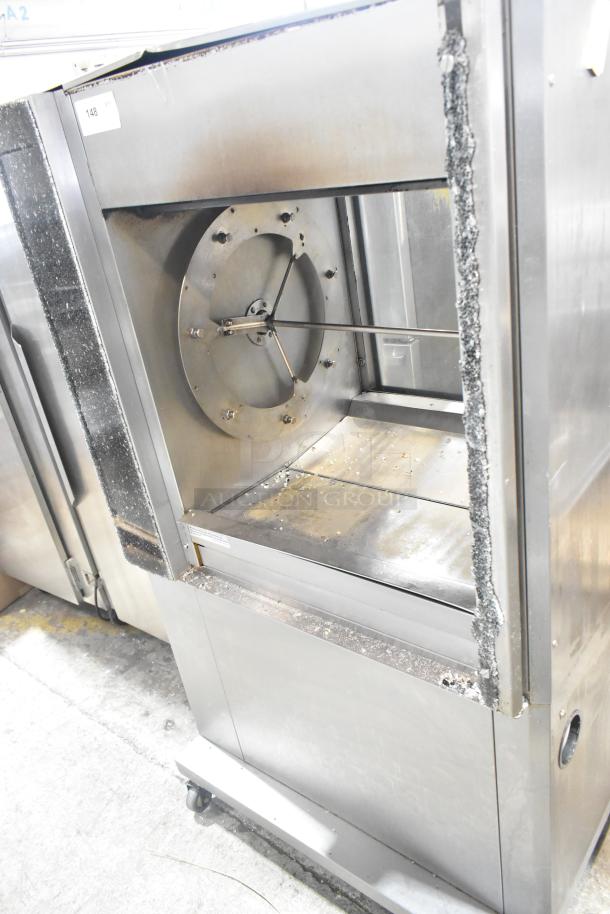 Fri-jado TDR7-P commercial rotisserie oven, electric, on casters. Note: broken glass visible. 208V, 3-phase.