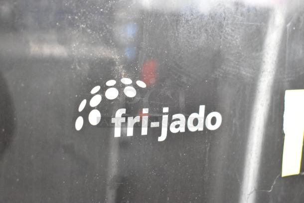 Fri-jado TDR7-P commercial electric rotisserie oven. Features logo detail. Note broken glass. 208V, 3-phase, on casters.