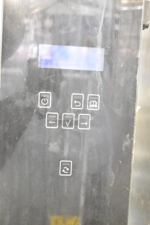 Fri-jado TDR7-P rotisserie oven control panel, electric, broken glass visible, 208 volts, 3-phase, on casters.