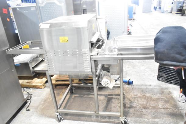 Belshaw Adamatic TG-50 stainless steel thermoglazing station on casters, 208V, 1 phase, in good condition, visible caution labels.