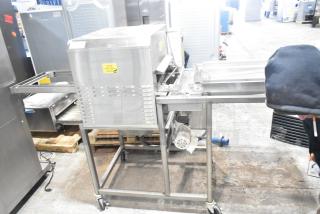 Belshaw Adamatic TG-50 stainless steel thermoglazing station on casters, 208V, 1 phase, in good condition, visible caution labels.