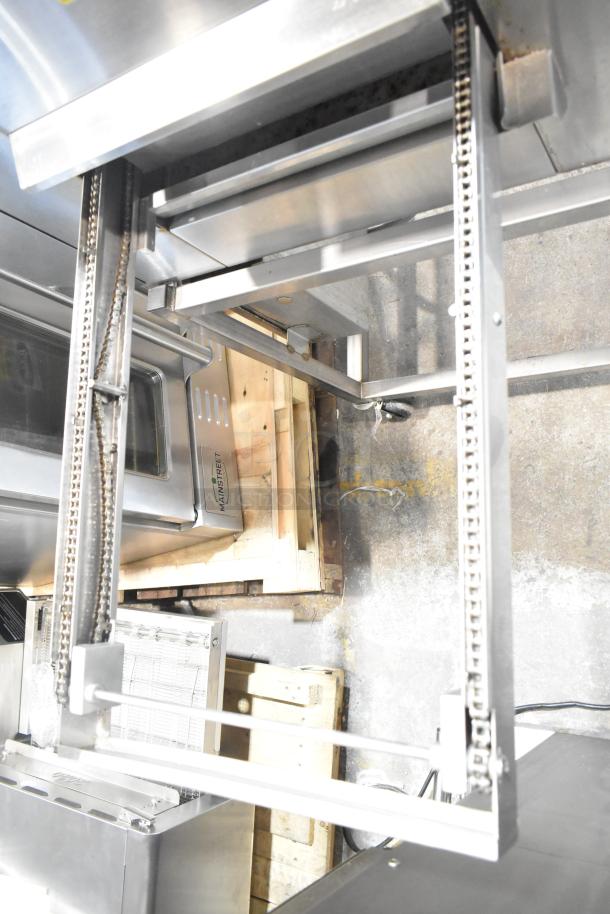 Belshaw Adamatic TG-50 stainless steel thermoglazing station on casters, 208V, 1 phase, commercial-grade, robust design.