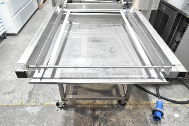 Belshaw Adamatic TG-50 stainless steel thermoglazing station. Commercial casters, 208V, 1 phase, floor style.