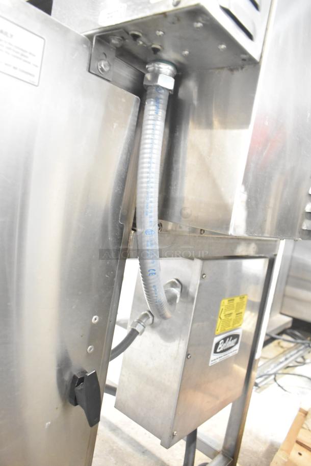 Belshaw Adamatic TG-50 stainless steel thermoglazing station on casters, 208V, 1 phase. Features visible labels and connections.