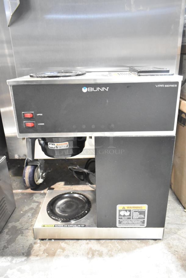 2021 Bunn VPR 12 Cup Pourover Coffee Brewer, black, with 2 warmers, 120V, 1 Phase, used condition, warning label visible.