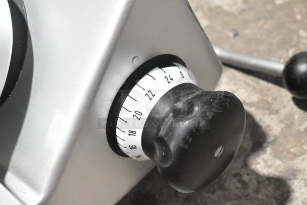 2016 Bizerba GSP H Commercial Slicer knob with adjustable thickness dial, showing minor wear, 120V, 1 Phase.