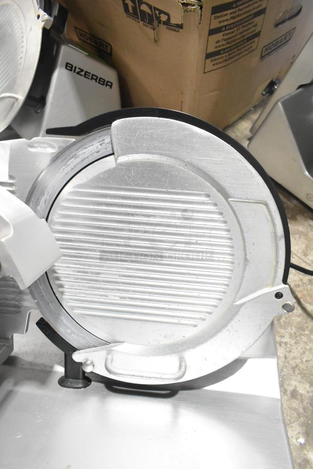 2016 Bizerba GSP H Commercial Meat Slicer, 120V, 1 Phase, countertop model. Features clean blade, visible Bizerba branding.