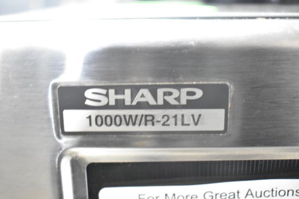 2023 Sharp R-21LVF Commercial Countertop Microwave, 1000W, stainless steel, label shows model and power details.
