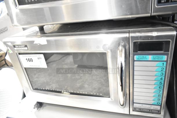 2022 Sharp R-21LVF commercial countertop microwave oven, stainless steel, 120 volts, 1 phase, visible control panel and label.