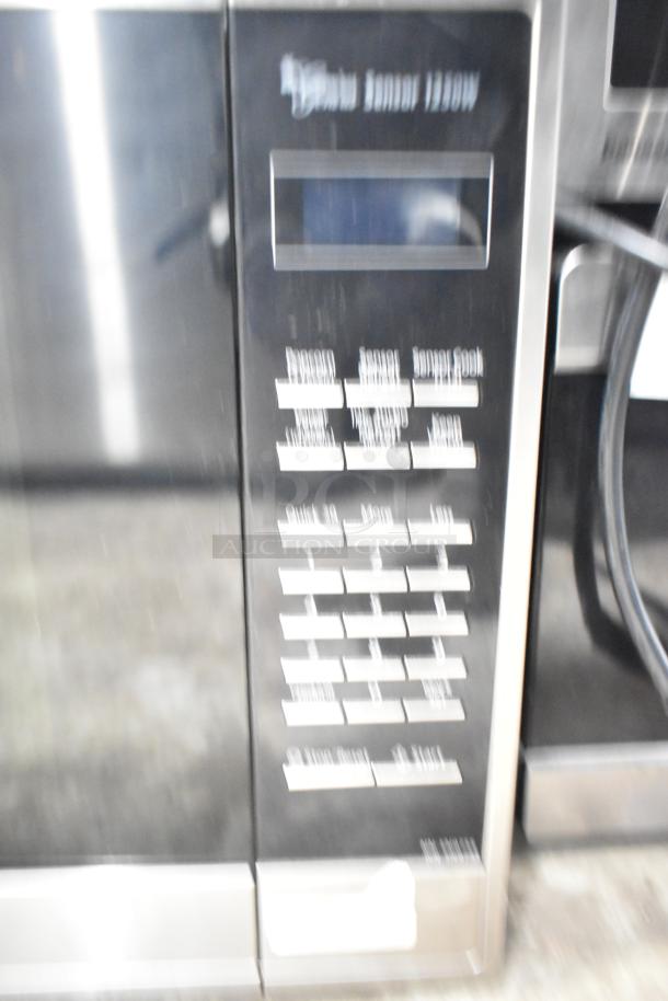 2020 Panasonic NN-SN975S Countertop Microwave Oven with plate, 120V, digital controls, slight cosmetic wear on exterior.