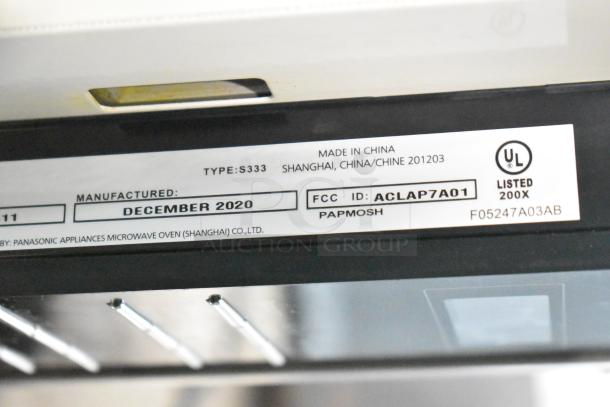 2020 Panasonic NN-SN975S microwave label, shows manufacture date December 2020, made in China, UL listed.