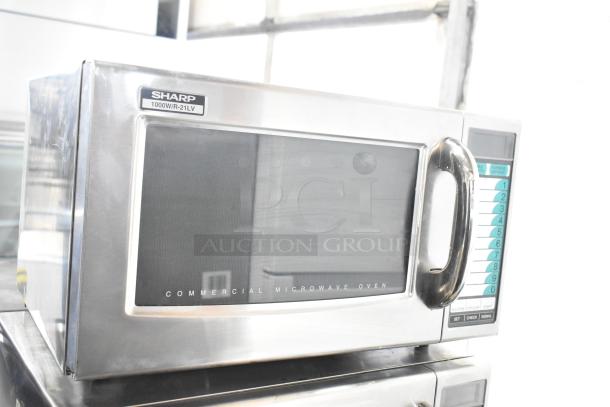 2023 Sharp R-21LVF Commercial Microwave, 1000W, stainless steel, keypad controls, good condition.