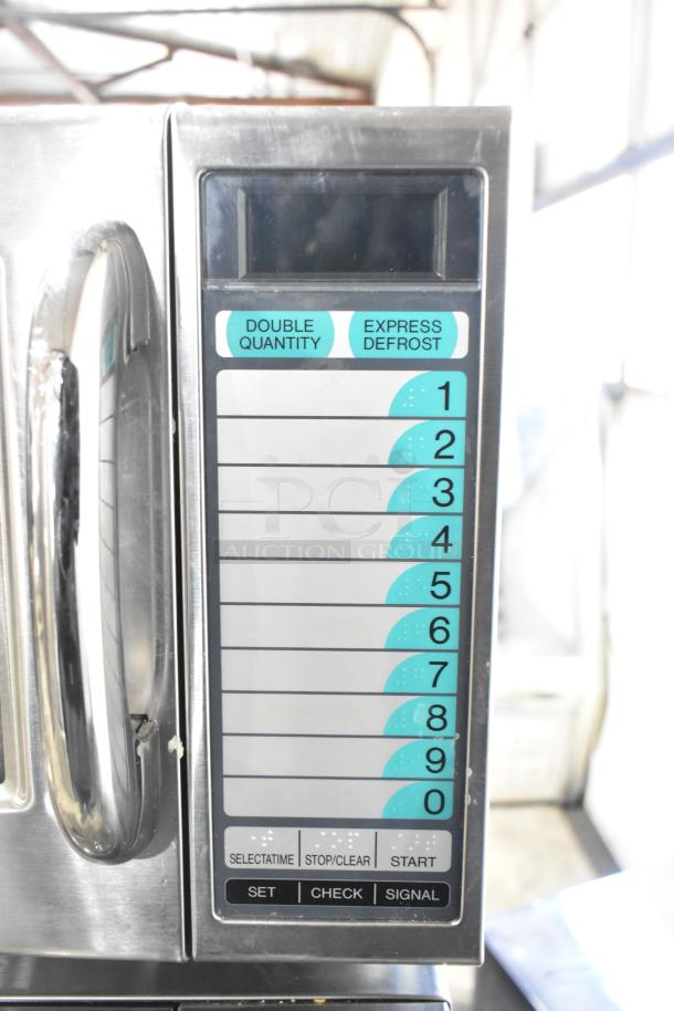 2023 Sharp R-21LVF commercial microwave, stainless steel, keypad controls, express defrost, 120V, 1 phase.
