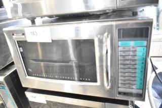Sharp R-21LVF commercial countertop microwave oven, 2024 model, 120 volts, 1 phase, digital controls, in good condition.
