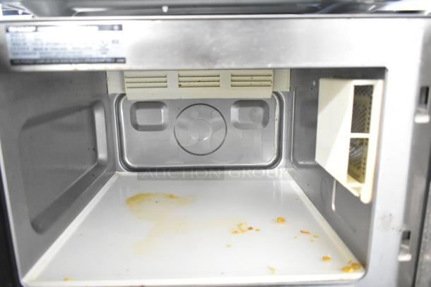 2024 Sharp R-21LVF Commercial Microwave Oven, 120V, interior view, minor stains, stainless steel, visible label.