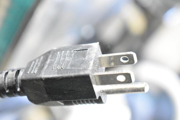 Close-up of a power plug for a Sharp R-21LVF Commercial Microwave Oven, 120 volts, 1 phase.