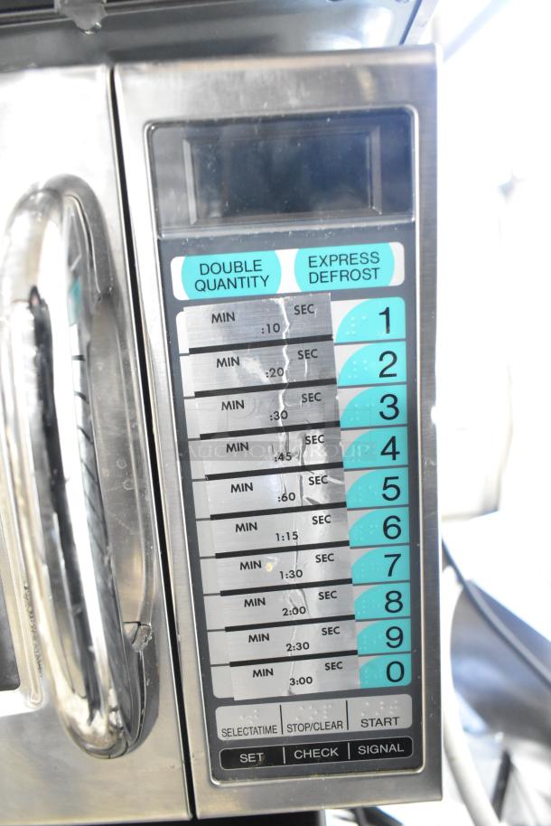 2024 Sharp R-21LVF Commercial Microwave Oven control panel with keypad and functions visible, silver finish.