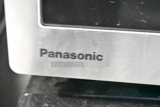 Panasonic countertop microwave oven, display unit, missing power cord, 120 volts, 1 phase, features stainless steel finish.
