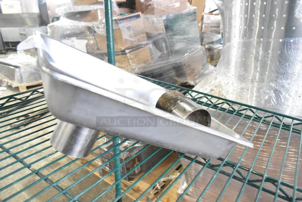 Tier lot including metal funnel, skillets, bowls, coffee pot, and metal pot on a green wire shelf. Used condition.