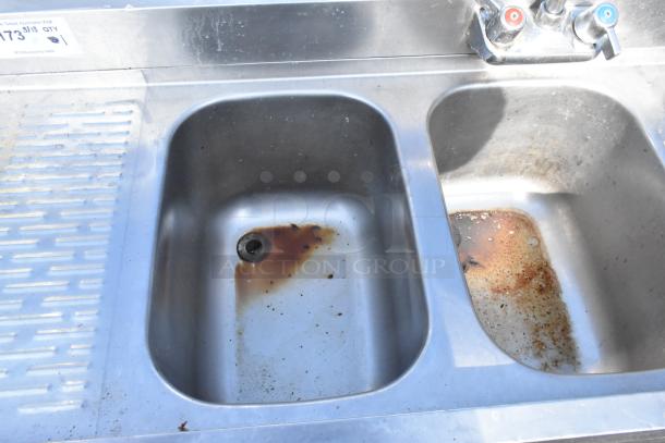 Krowne 18-43R commercial 3-bay back bar sink with left side drain board, faucet and handles. Visible wear and rust in basins.