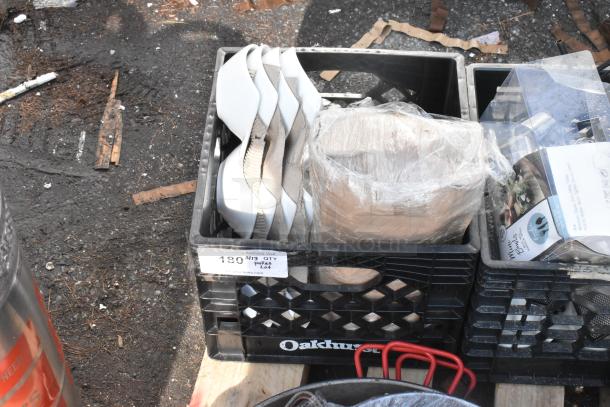 Pallet lot of various items including baking pans and skillets in Oakhurst crate, wrapped in plastic. Condition varies.