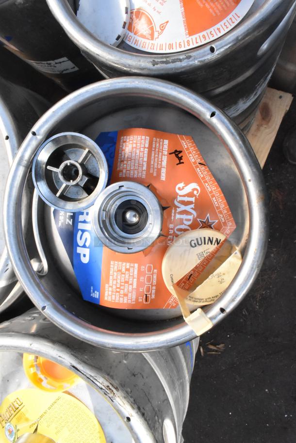 Twelve assorted kegs with various labels and markings, indicating brands such as Sixpoint. Each bid applies to 12 kegs.