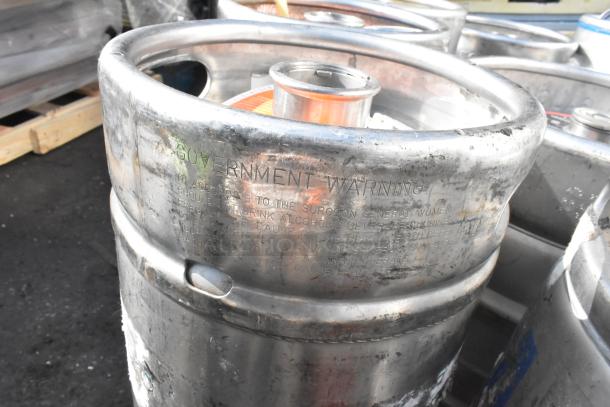 12 stainless steel kegs, visible wear, government warning label, 12 times bid value.